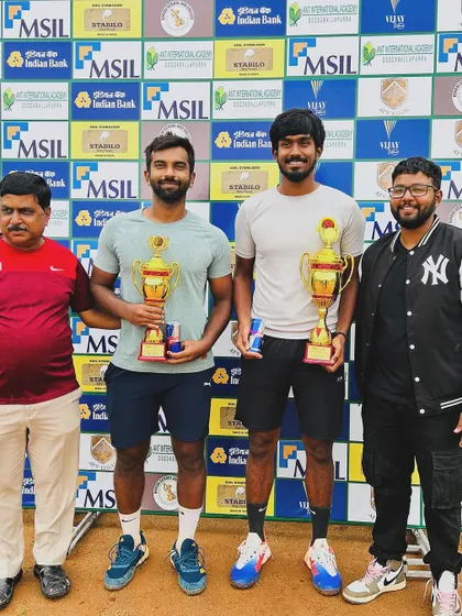 Our head coach with the singles winner and finalist at the AITA 1 Lakh tournament. We are deeply involved in our players' success on and off the court.