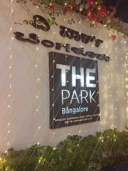 The entrance to The Park Bangalore, adorned with festive lighting. Our branding is integrated with beautiful decor to create a memorable first impression.
