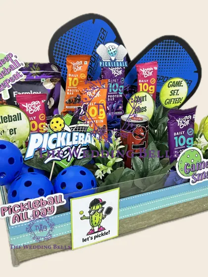 A closer look at the details of our sporty Pickleball Rakhi hamper. We've included fun, quirky stickers and all the essentials for a health-conscious sibling who loves a good match.