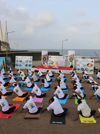 Another view of our Yoga Day event, with students moving into a seated twist. The colorful mats against the backdrop of the sea and Bandra-Worli Sea Link was a beautiful sight.