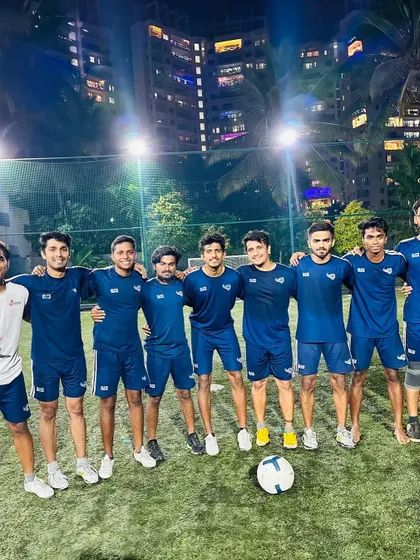 Our team of coaches after a friendly match. We practice what we preach about teamwork and fitness.