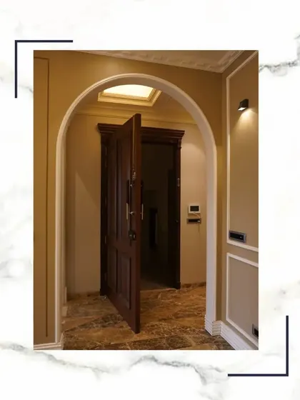 This property is a testament to meticulous craftsmanship. The arched entryway with a solid, grand wooden door showcases the innovative architecture and attention to detail we are known for.