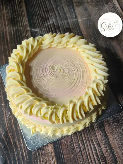 This is the simple and sweet smash cake I made for little Nila's first birthday. The soft pastel colors and swirled buttercream are perfect for a baby's first taste of cake.