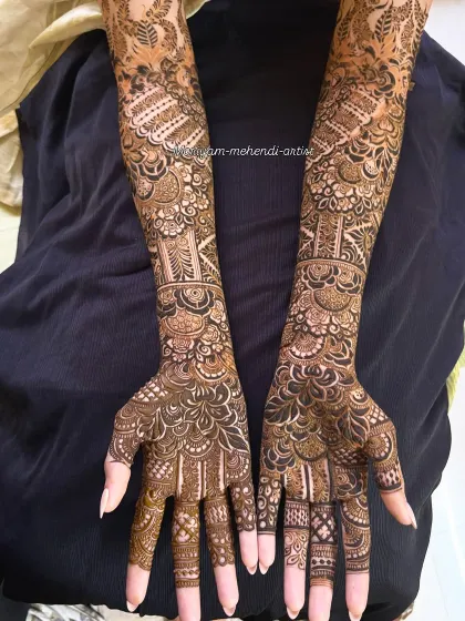 This bridal design features a mix of checks, florals, and traditional Indian motifs.