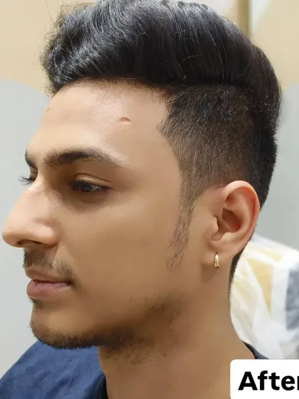 A profile view of the final haircut, highlighting the clean lines and modern look.