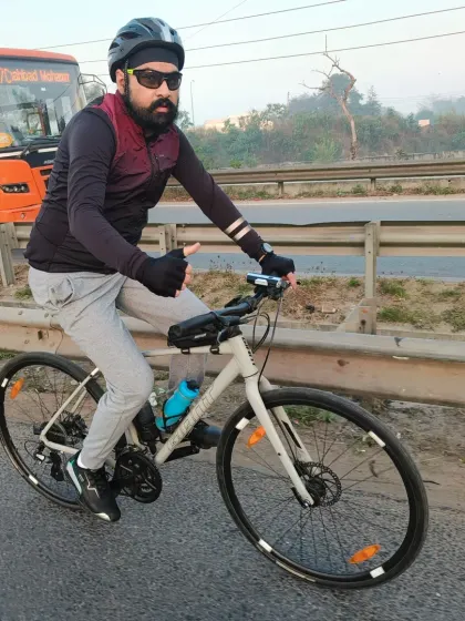 A thumbs-up from a rider on the move. Our Tuesday group rides are all about positive energy and enjoying the journey.