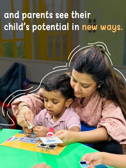 A mother helps her son with a puzzle, her gentle guidance fostering his confidence. In our classes, parents become active partners in their child's learning journey, seeing their potential in new ways.