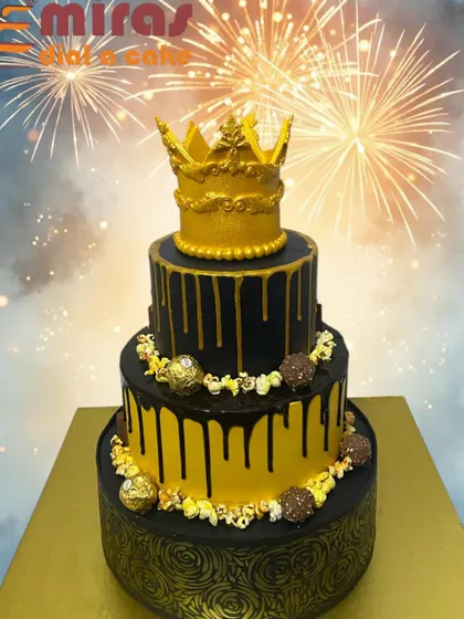 A majestic three-tier black and gold drip cake topped with a crown. This luxurious cake is perfect for a milestone birthday, exuding elegance and grandeur.
