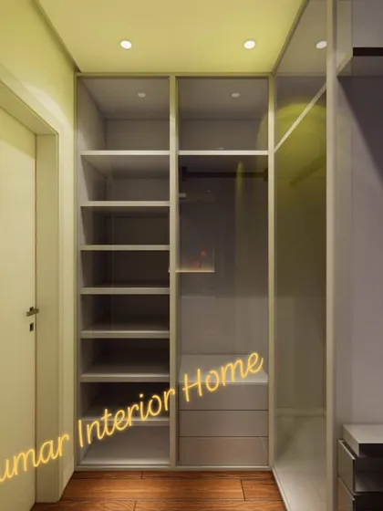 A view of a custom wardrobe with translucent glass doors, offering a glimpse of the contents while maintaining a neat appearance.