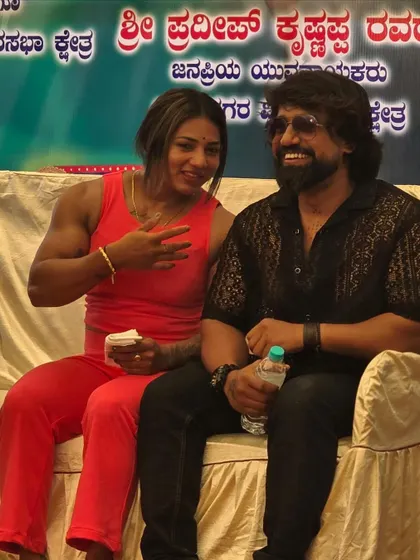 Sharing a light-hearted moment on stage. While I'm serious about my training, I also believe in enjoying the journey.
