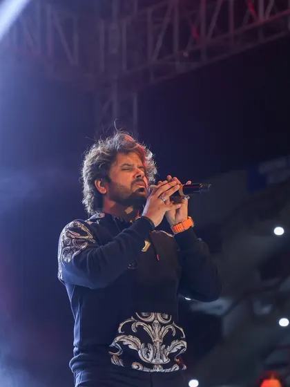 A close-up of Javed Ali during an emotional moment in his performance. Our team ensures the artist has everything they need to connect with the audience.