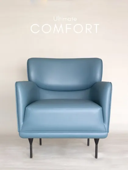 This leather armchair with its sleek metal legs is the epitome of ultimate comfort. The design is modern, but the feel is timelessly luxurious.