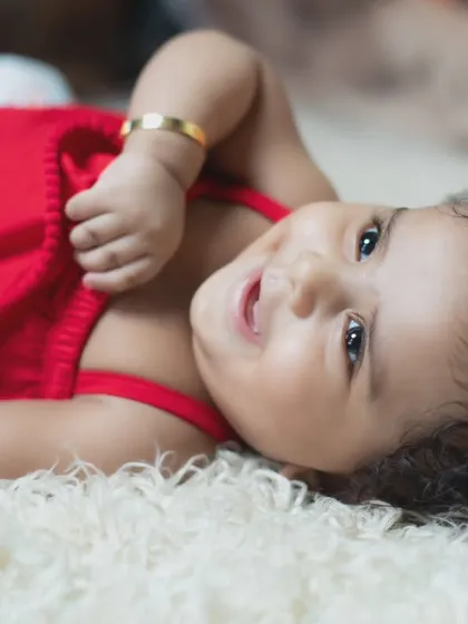 This little one's joyful expression is simply contagious.
