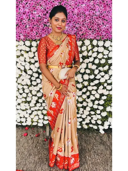 A full-length view of the elegant patola silk saree and custom blouse.