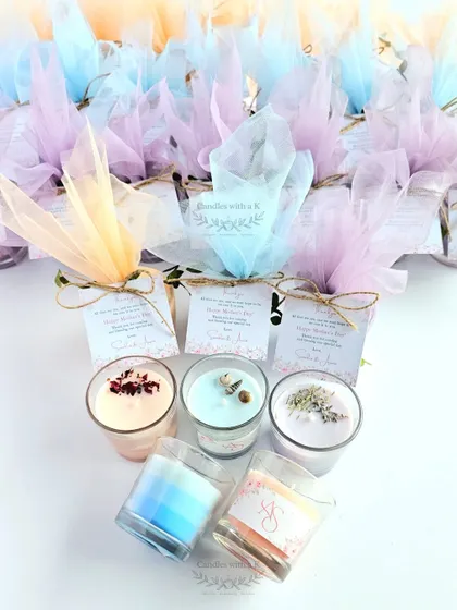A beautiful custom order of layered votive candles for Sandra's wedding, featuring three different color schemes and scents: Lavender Lemongrass, Rose Vanilla, and Ocean.