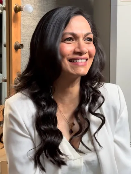 A happy, candid moment from a shoot. This look proves that simple, clean makeup and soft waves are always a beautiful choice.