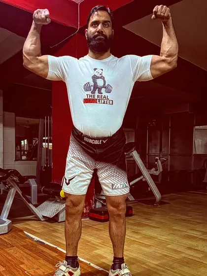 Wearing a shirt that says "The Real Deadlifter." It's more than an exercise; it's a commitment to building foundational, real-world strength.