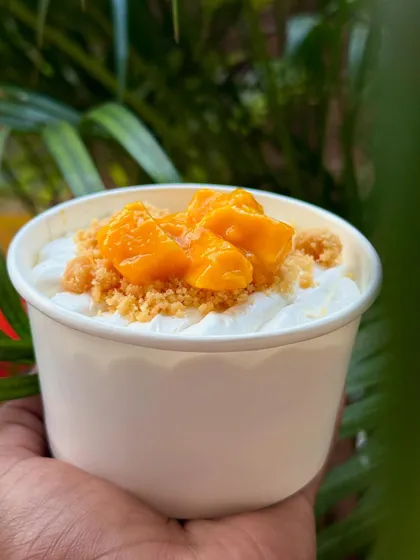 Our Mango Cheesecake Pot is the ultimate summer treat. It's creamy, light, and bursting with the flavor of fresh Alphonso mangoes.