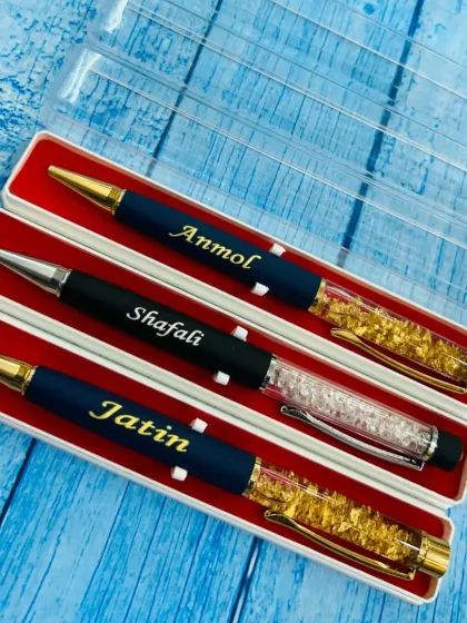My personalized pens come in different styles, including these elegant crystal and gold-flake designs. Each can be engraved with a name.
