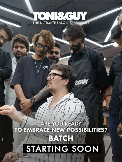 "Are you ready to embrace new possibilities?" An instructor demonstrates a technique to an attentive group of students, capturing the collaborative and mentor-driven nature of our hairdressing courses.