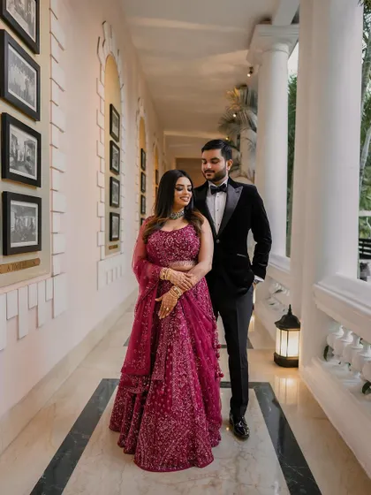 A stunning reception look at the Taj Westend. We use dramatic lighting and elegant backdrops to create sophisticated and timeless portraits for your evening events.
