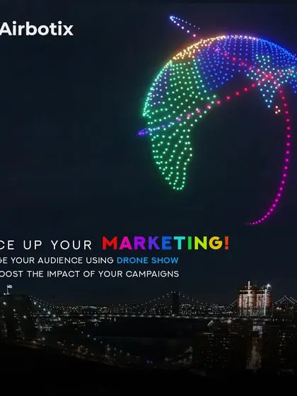 Spice up your marketing with a drone show. This image of a multi-colored dolphin illustrates how we can create captivating visuals that boost campaign impact and audience engagement.