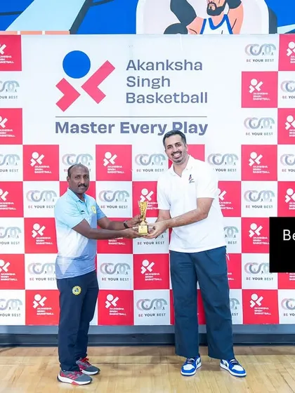 We also recognize the minds behind the teams. Presenting the Best Coach award to Sathya Sir for his outstanding leadership of the girls' team during the Winter League.