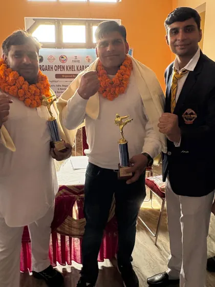 With fellow coaches, celebrating our collective success at a tournament.