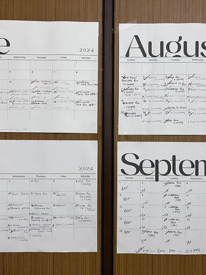This image from a member's post shows the dedication behind the success. A training calendar filled with our workouts, proving that consistency and a structured plan lead to results.