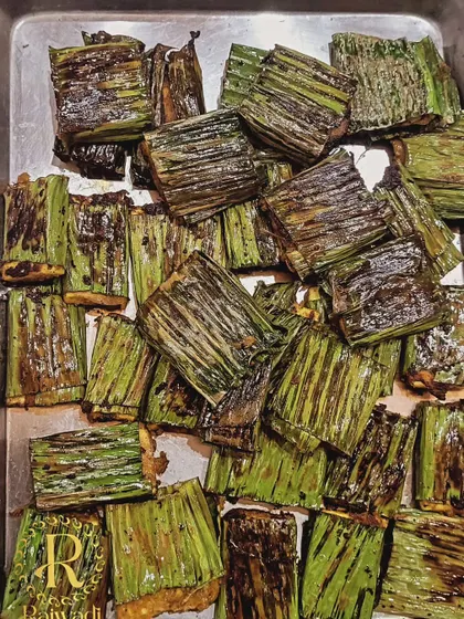 I love creating unique vegetarian appetizers. This is my popular paneer starter, marinated and grilled inside banana leaves, which imparts a subtle, smoky flavor. It's a dish that always gets guests talking.