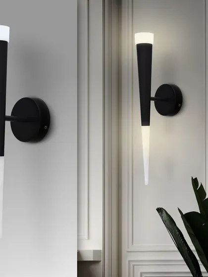 A pair of these torch sconces creates a balanced and sophisticated look.