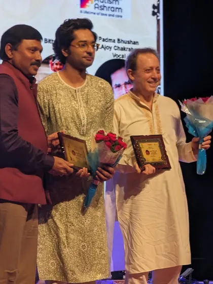 Receiving a token of appreciation alongside Ken Zuckerman ji after our performance at a festival in Hyderabad.