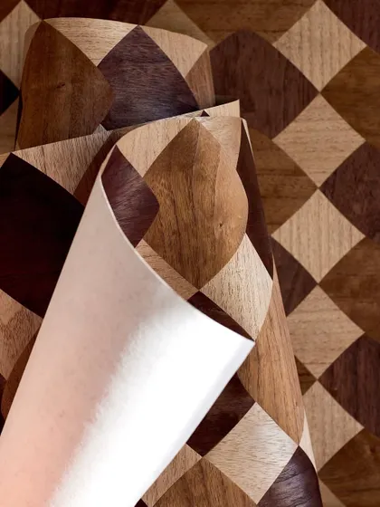 A detailed shot of a diamond-patterned wood marquetry wallcovering. The paper-thin slices of wood are carefully arranged to create a striking geometric design with natural variations in color and grain.