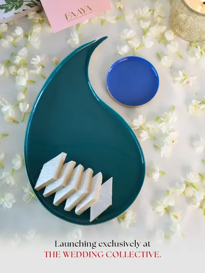 A closer look at our paisley tray, filled with kaju katli. This piece was launched exclusively at The Wedding Collective, designed for gifting with meaning.