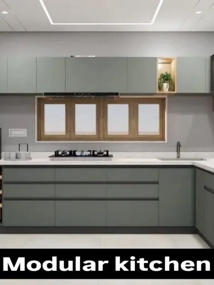 A 3D render of a beautiful L-shaped modular kitchen in a sage green finish. This design includes a mix of closed cabinets, drawers, and open shelving for a balanced look.