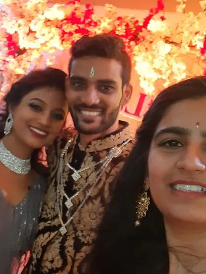 A happy selfie with the beautiful couple, Lisha and Darshan, at their wedding Sangeet celebration. Capturing these smiles after a successful event is one of the best parts of my job as a wedding host.