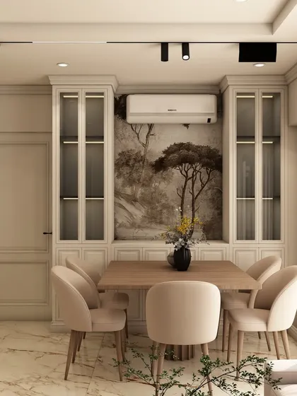 A different perspective of the dining space, highlighting the clean lines of the furniture and the effective use of track lighting to create a warm and focused dining environment.