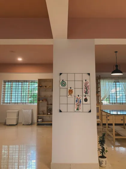 We love adding personal touches, like this art grid, to make the space feel like a gallery of inspiration. It’s a reminder of the diverse creativity that our community brings to the studio every day.
