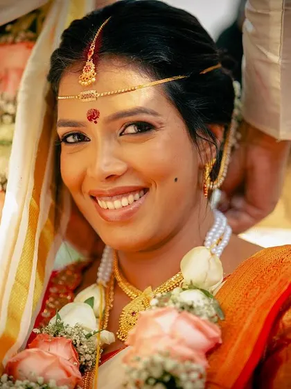 A bright, beautiful smile from the bride. I created a minimal makeup look that enhances her natural glow and lets her happiness shine through.