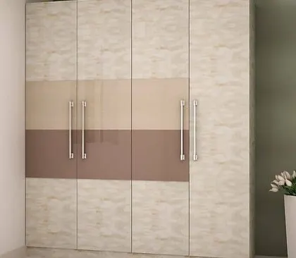A four-door wardrobe with a beautiful tri-color panel design in neutral tones, complemented by sleek, modern steel handles.
