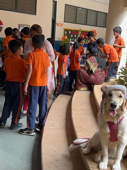 The dogs and I had a wonderful time at a school's winter carnival. Surrounded by kids and food, they were perfectly behaved, showing their potential as therapy dogs. I hope more schools open their doors to the benefits of having dogs around children.