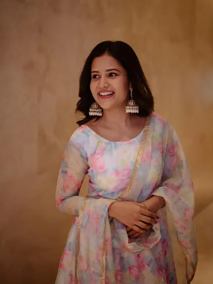 A candid and happy portrait of actress Brinda Acharya. Her bright smile and the soft, warm lighting make this a very engaging and personable shot.