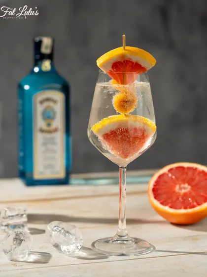 It’s always Gin O’ Clock somewhere. This is one of my signature gin cocktails, crafted to be as beautiful as it is delicious. Come by on a weekday for my one-plus-one happy hour deals.