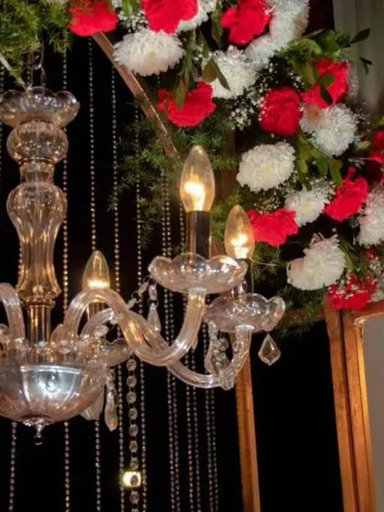 A close-up of a crystal chandelier used in one of our wedding decorations. These details add a touch of luxury and sparkle to the overall ambiance.