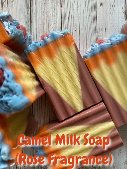 This soap looks like a slice of cake. It has a lovely Rose fragrance and features colorful piped "frosting" on top, making it a truly unique designer bar.
