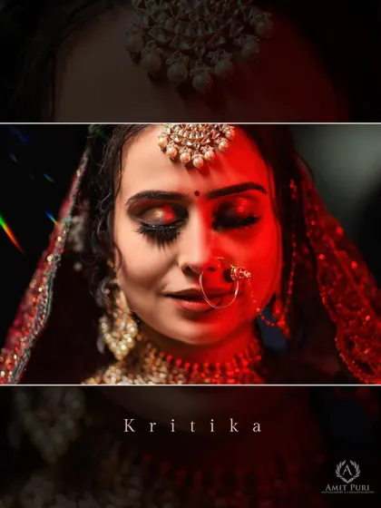 A close-up bridal portrait with dramatic red lighting. This creative technique adds intensity and passion to the image, highlighting her beautiful features and makeup.