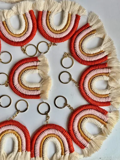 The texture and craftsmanship of my macrame rainbow keychains up close. The soft fringe and tight knots show the care I put into every single piece.