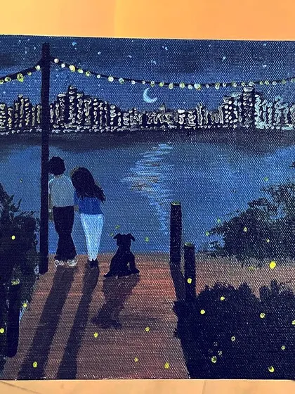 This painting captures a couple and their dog enjoying a quiet moment on a pier, with the city skyline glittering across the water. The fireflies in the foreground and the string lights above add a touch of magic to this peaceful night scene.