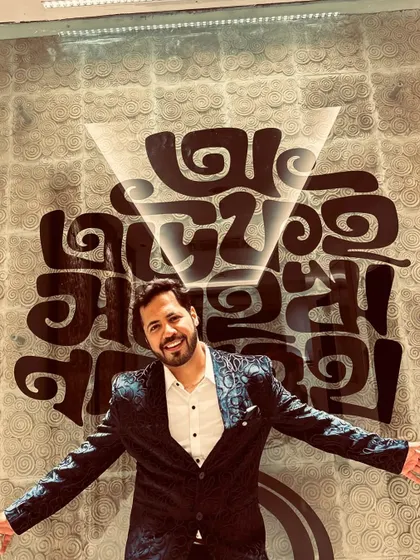 An expressive, open-armed pose that says "welcome to the party".