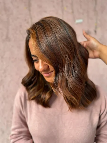 A beautiful cut and color for this lovely bride. The soft waves and warm brown tones are perfect for a romantic wedding look. (No filter)